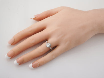Bezel Diamond Halo Engagement Ring in Platinum