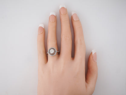 Diamond Filigree Cluster Engagement Ring in Platinum
