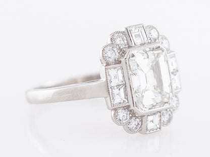 Emerald Cut Diamond Halo Engagement Ring in Platinum