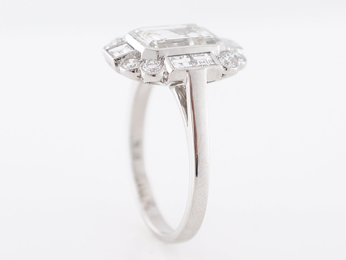 Emerald Cut Diamond Halo Engagement Ring in Platinum