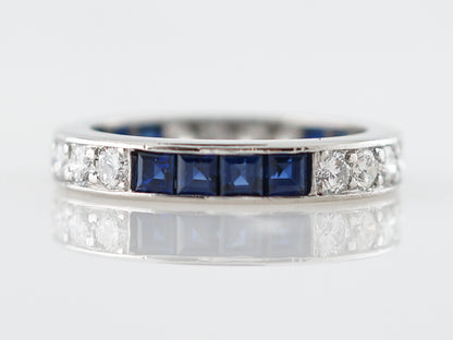 Eternity Wedding Band Modern .48 Round Brilliant Cut Diamonds & Sapphire in Platinum