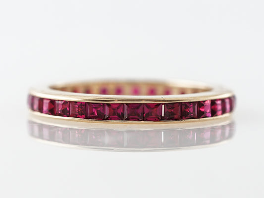 Ruby Eternity Wedding Band in 14k Yellow Gold