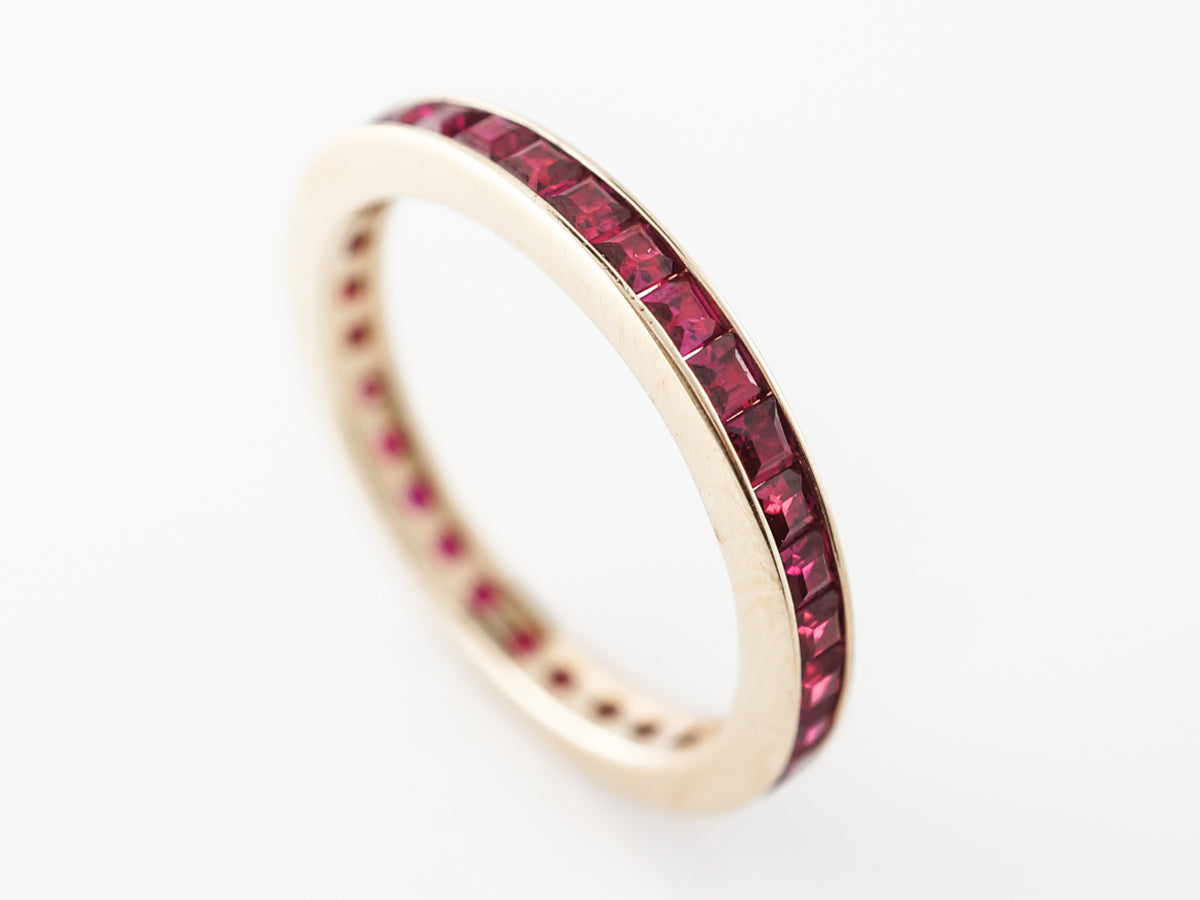 Ruby Eternity Wedding Band in 14k Yellow Gold