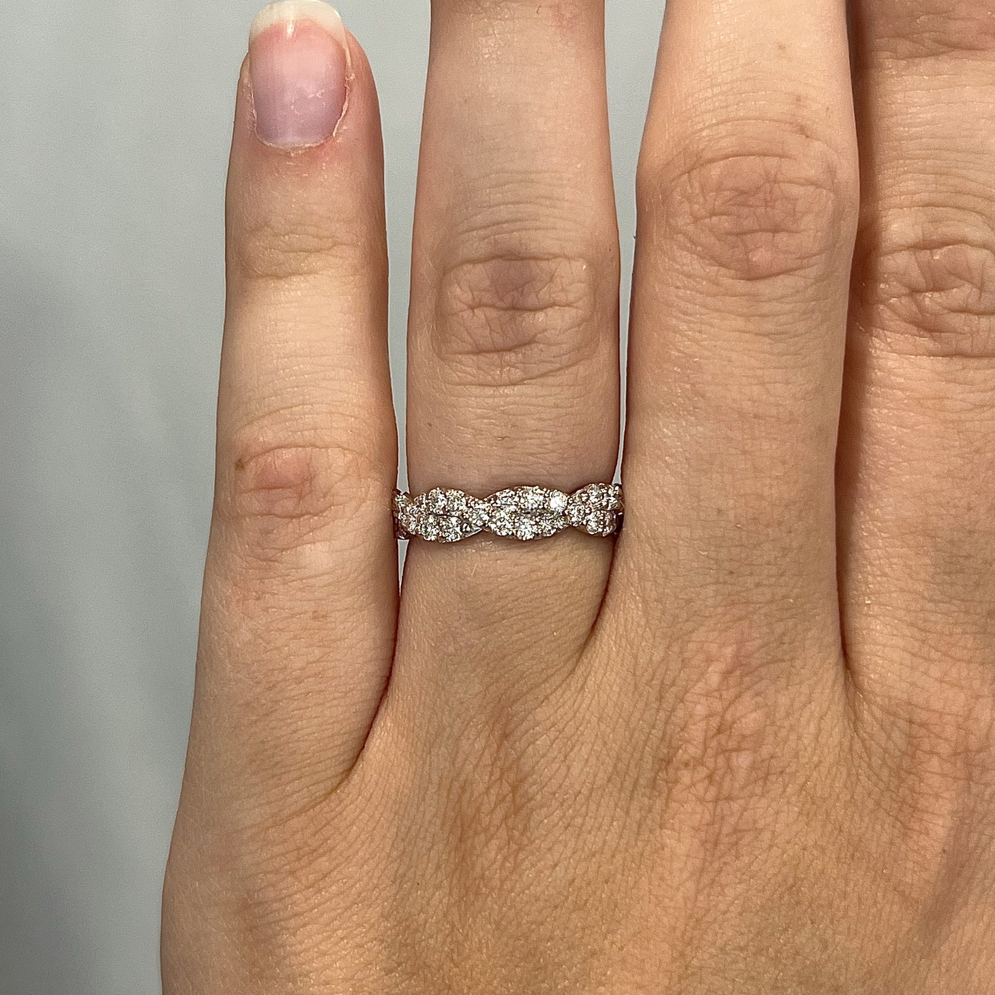 Braided Pave Diamond Wedding Band in 14k White GoldComposition: 14 Karat White Gold Ring Size: 7 Total Diamond Weight: .76ct Total Gram Weight: 3.2 g Inscription: 14k
      