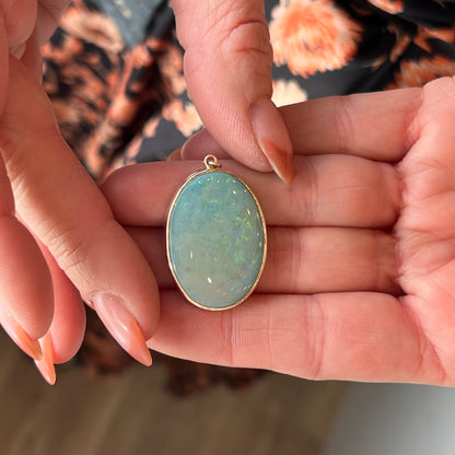 Modern Bezel Set Opal Pendant in 14k Yellow Gold