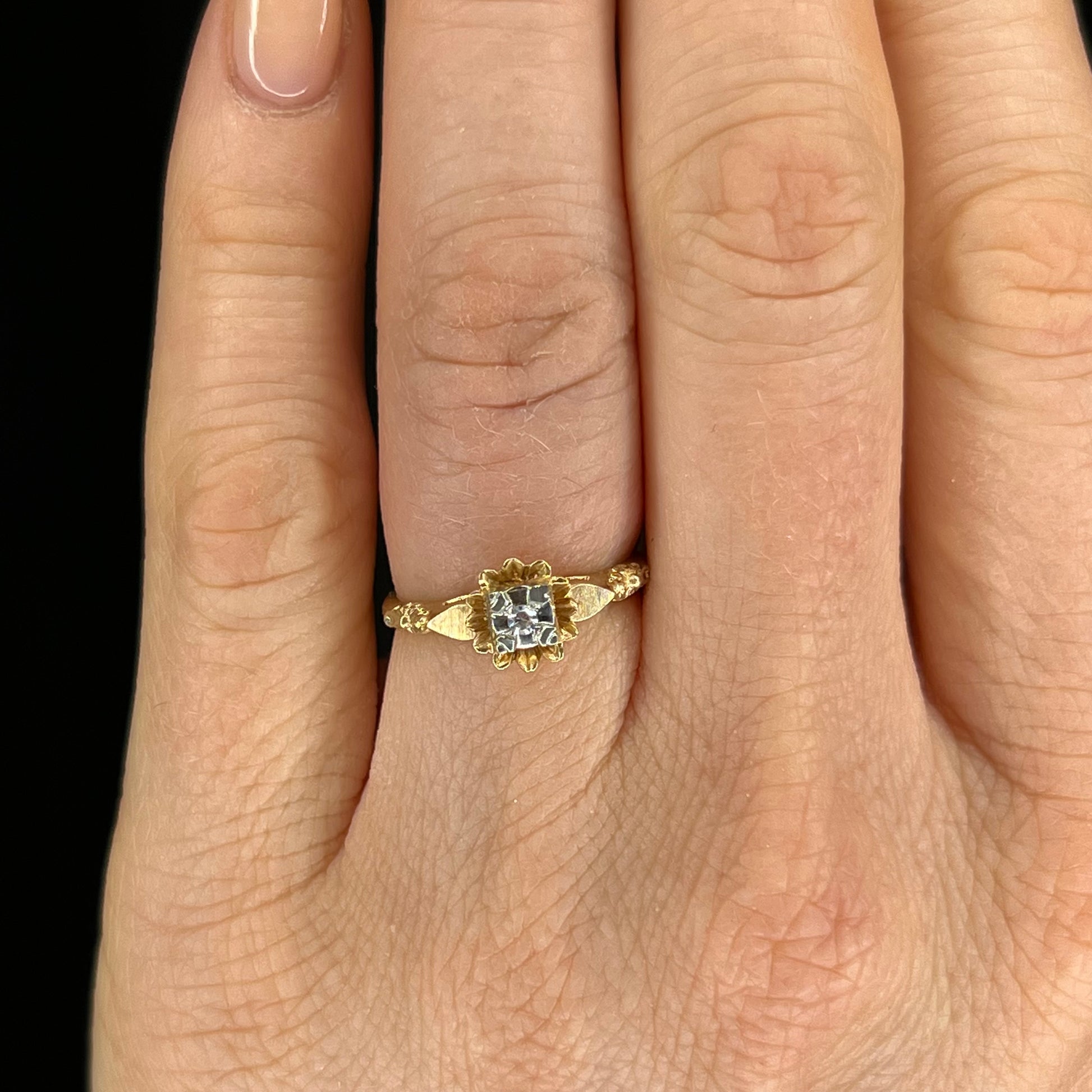 Retro Delicate Diamond Engagement Ring in 14k & 18k GoldComposition: 14 Karat Yellow Gold/18 Karat White GoldRing Size: 6.25Total Diamond Weight: .04 ctTotal Gram Weight: 1.7 gInscription: 14-18k