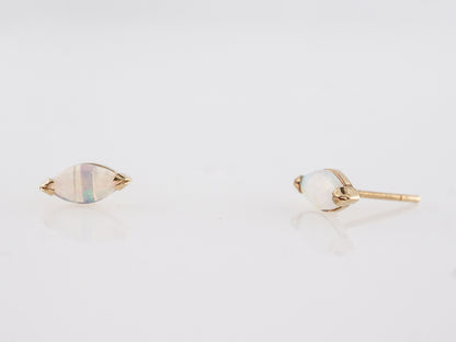 Marquise Shaped Opal Stud Earrings in 14k Yellow Gold