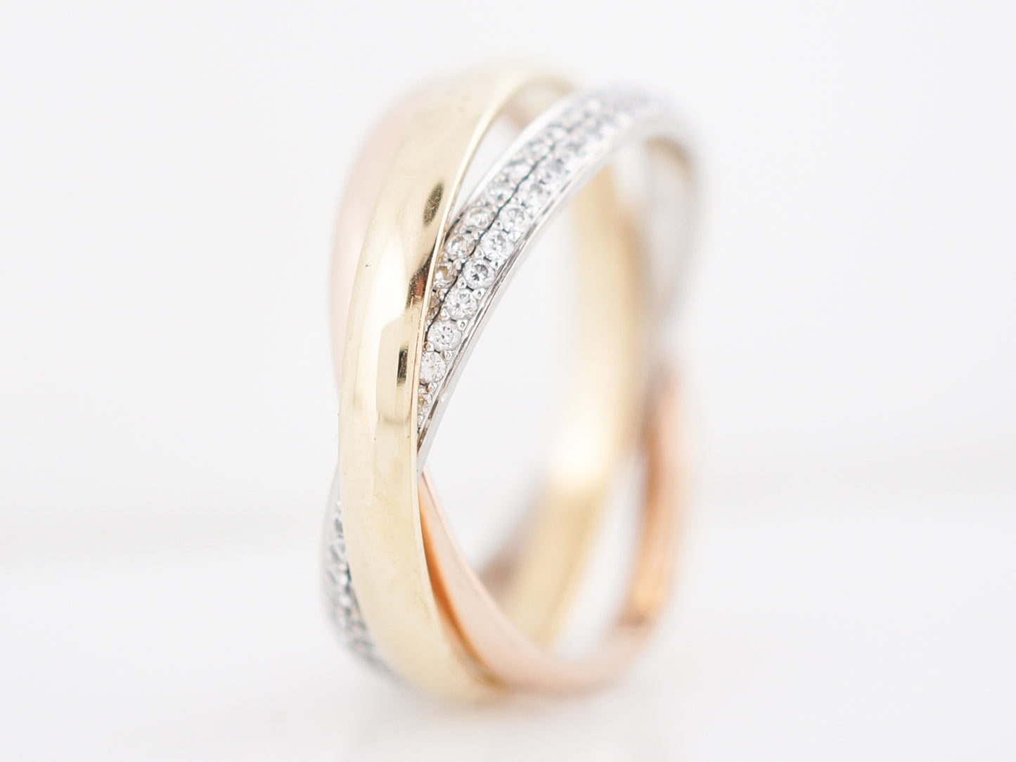 Cartier Trinity Roll Ring Modern 1.18 Round Brilliant Diamonds in 18k Yellow, White, & Rose Gold