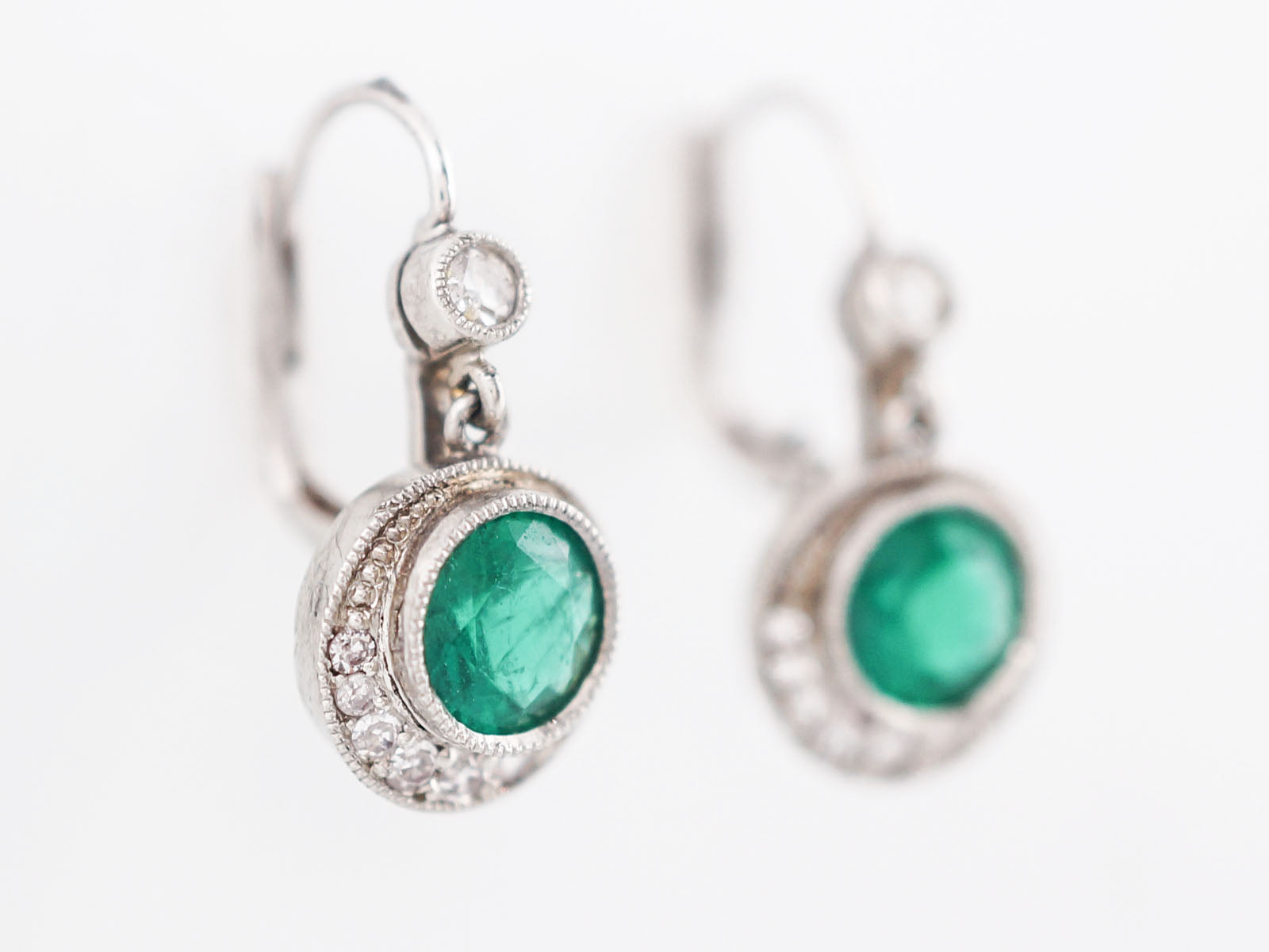 Modern Earrings 2.00 Round Cut Emeralds & .24 Round Brilliant Cut Diamonds in Platinum