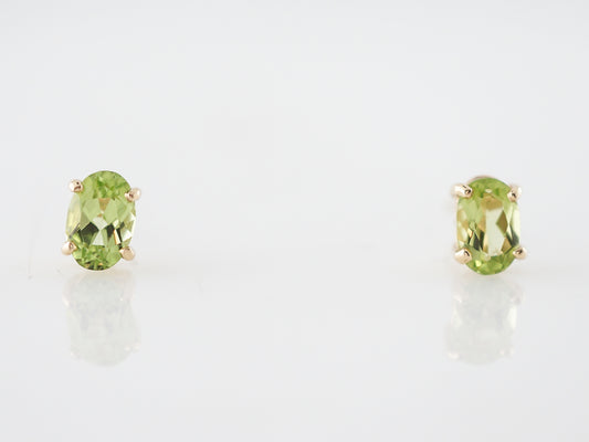 Earrings Modern .80 Oval Cut Peridot in 14k Yellow Gold