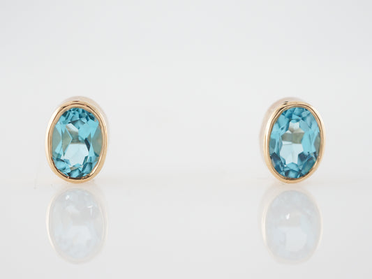 Earrings Modern 3.20 Oval Cut Blue Topaz in 14k Yellow Gold