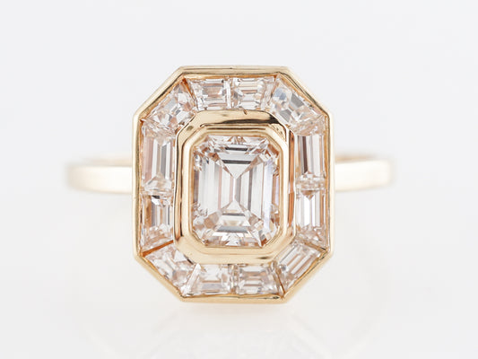 Halo Emerald Cut Diamond Engagement Ring in Yellow Gold