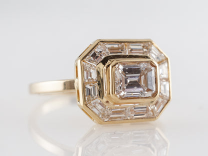 Emerald Cut Halo Diamond Engagement Ring in Yellow Gold