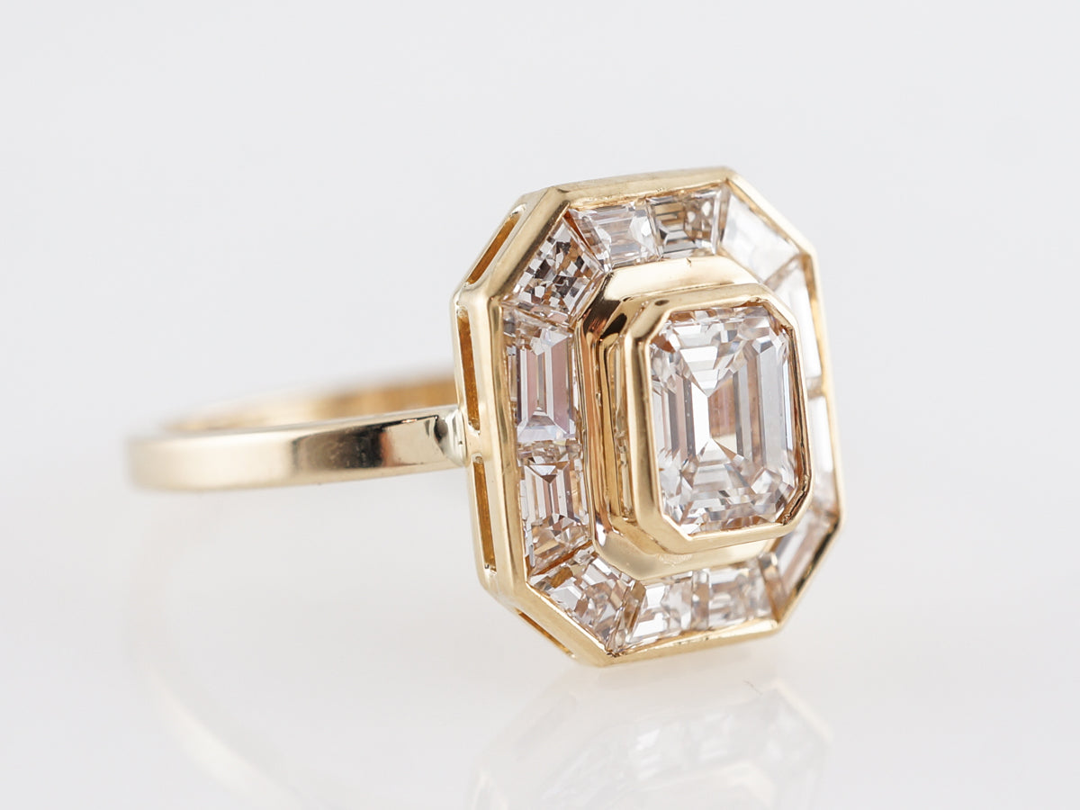 Halo Emerald Cut Diamond Engagement Ring in Yellow Gold