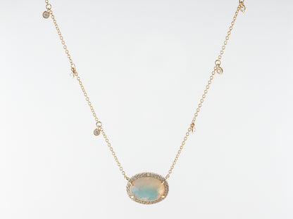 Cabochon Opal & Diamond Pendant in 18k Yellow Gold