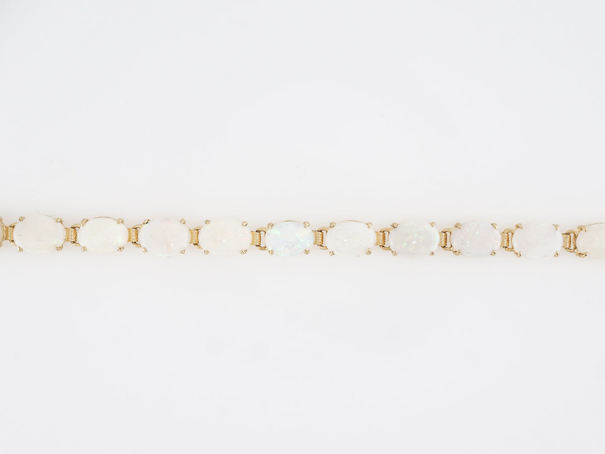 Cabochon Cut Opal Bracelet in 14k Yellow Gold