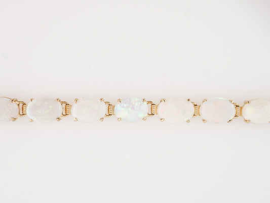 Cabochon Cut Opal Bracelet in 14k Yellow Gold