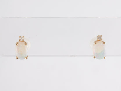 Cabochon Opal Stud Earrings in 14k Yellow Gold