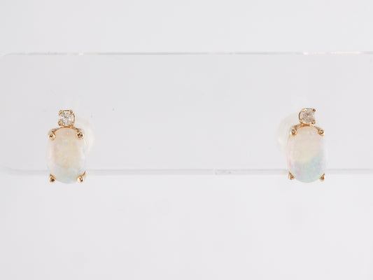 Cabochon Opal Stud Earrings in 14k Yellow Gold