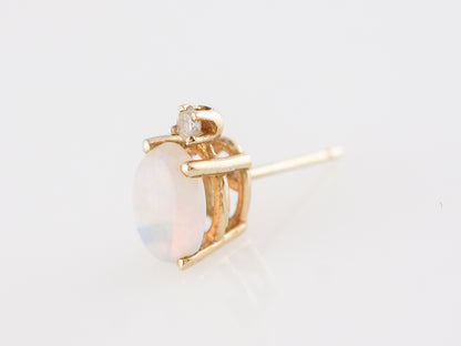 Cabochon Opal Stud Earrings in 14k Yellow Gold