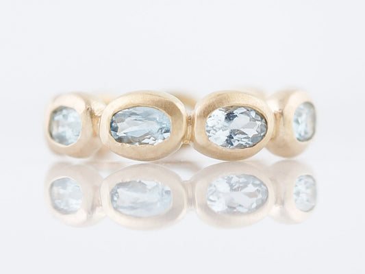 Modern Right Hand Ring 2.25 Oval Cut Aquamarine in 14K Yellow Gold