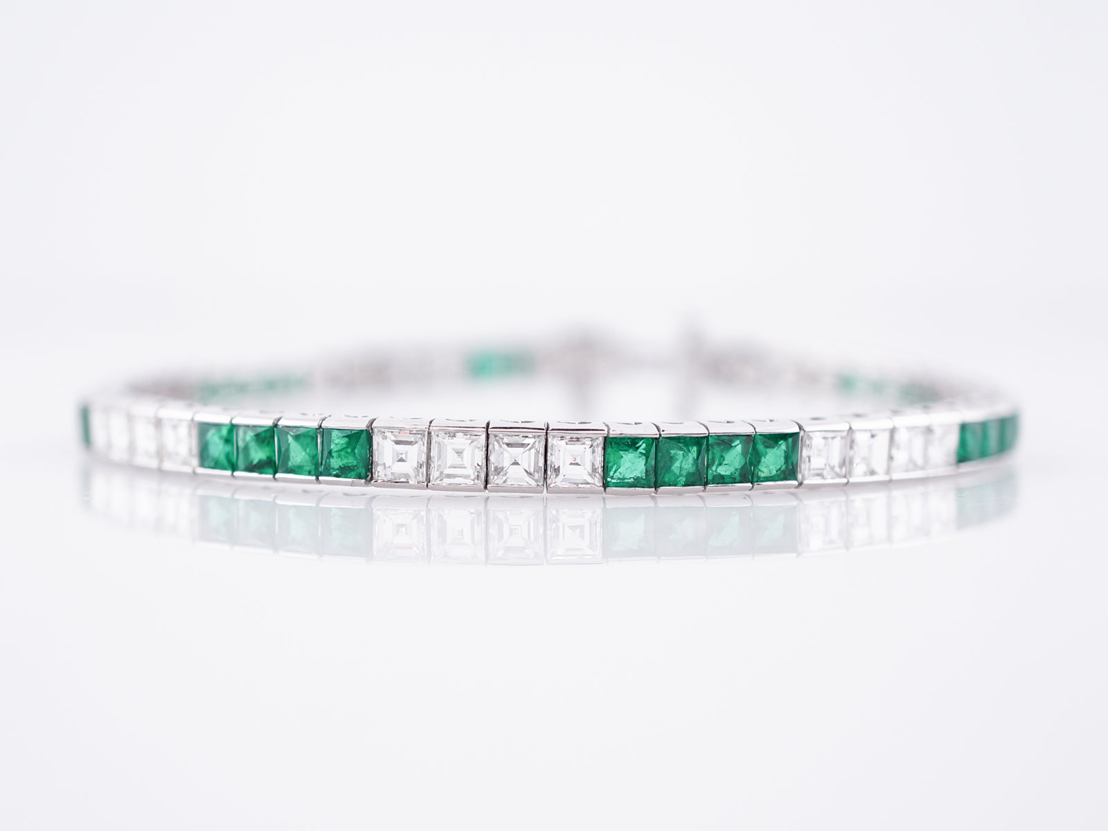 Straight Line Bracelet Modern 5.17 Emerald Cut Diamonds &  3.35 Step Cut Emeralds in Platinum