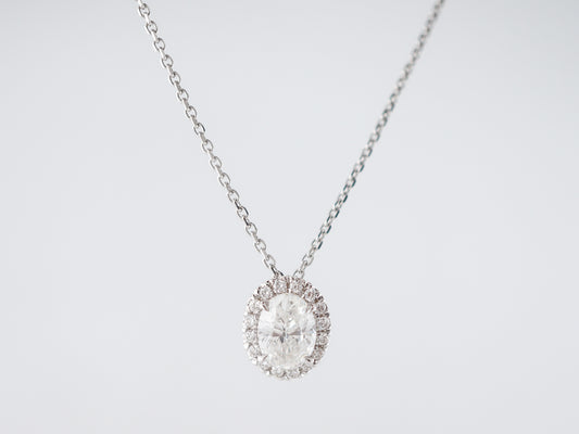 Oval Cut Diamond Halo Pendant in 18k White Gold