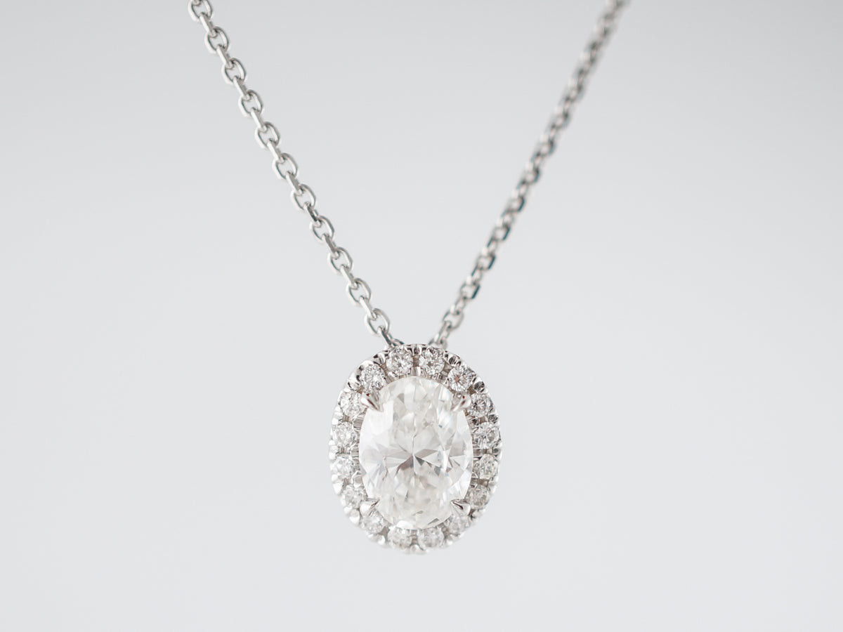 Oval Cut Diamond Halo Pendant in 18k White Gold