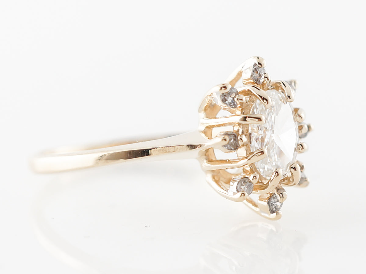 Oval Diamond Halo Engagement Ring in Yellow Gold