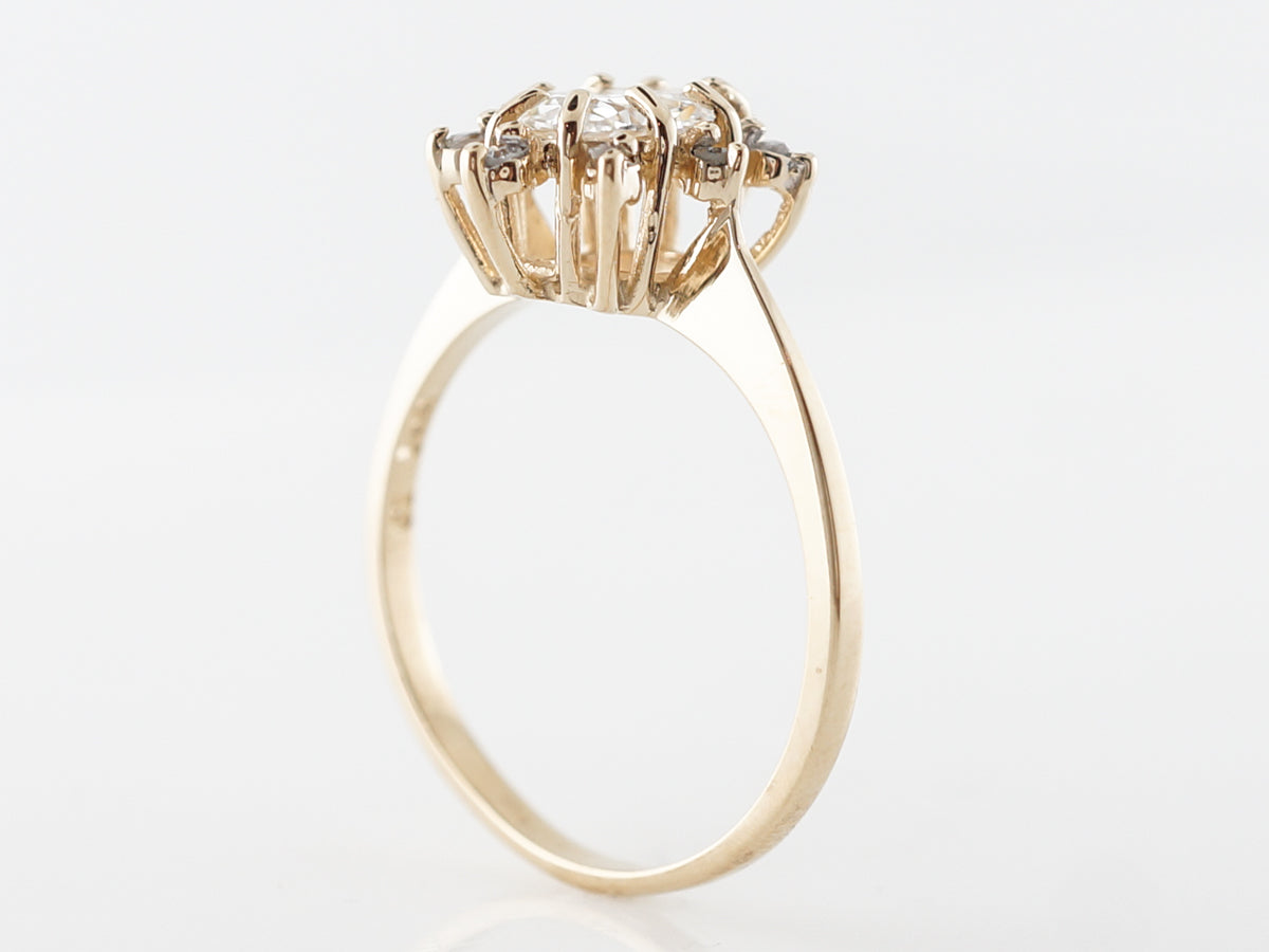 Oval Diamond Halo Engagement Ring in Yellow Gold