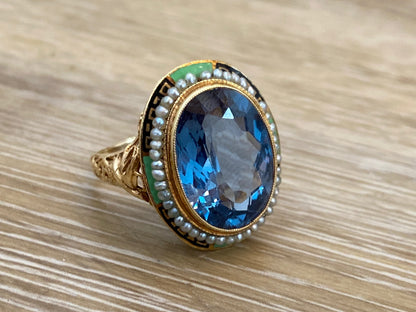 Oval Cut Blue Topaz Cocktail Ring in 14k Yellow Gold