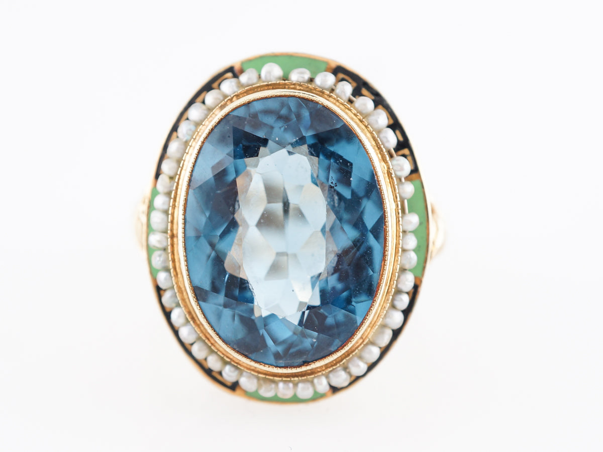 Oval Cut Blue Topaz Cocktail Ring in 14k Yellow Gold