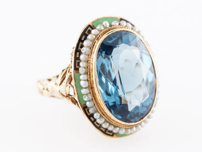 Oval Cut Blue Topaz Cocktail Ring in 14k Yellow Gold