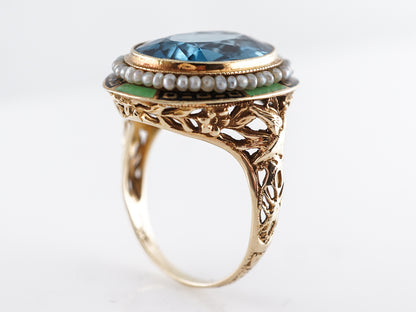 Oval Cut Blue Topaz Cocktail Ring in 14k Yellow Gold