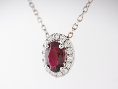 Oval Cut Ruby & Diamond Necklace in 14k White Gold