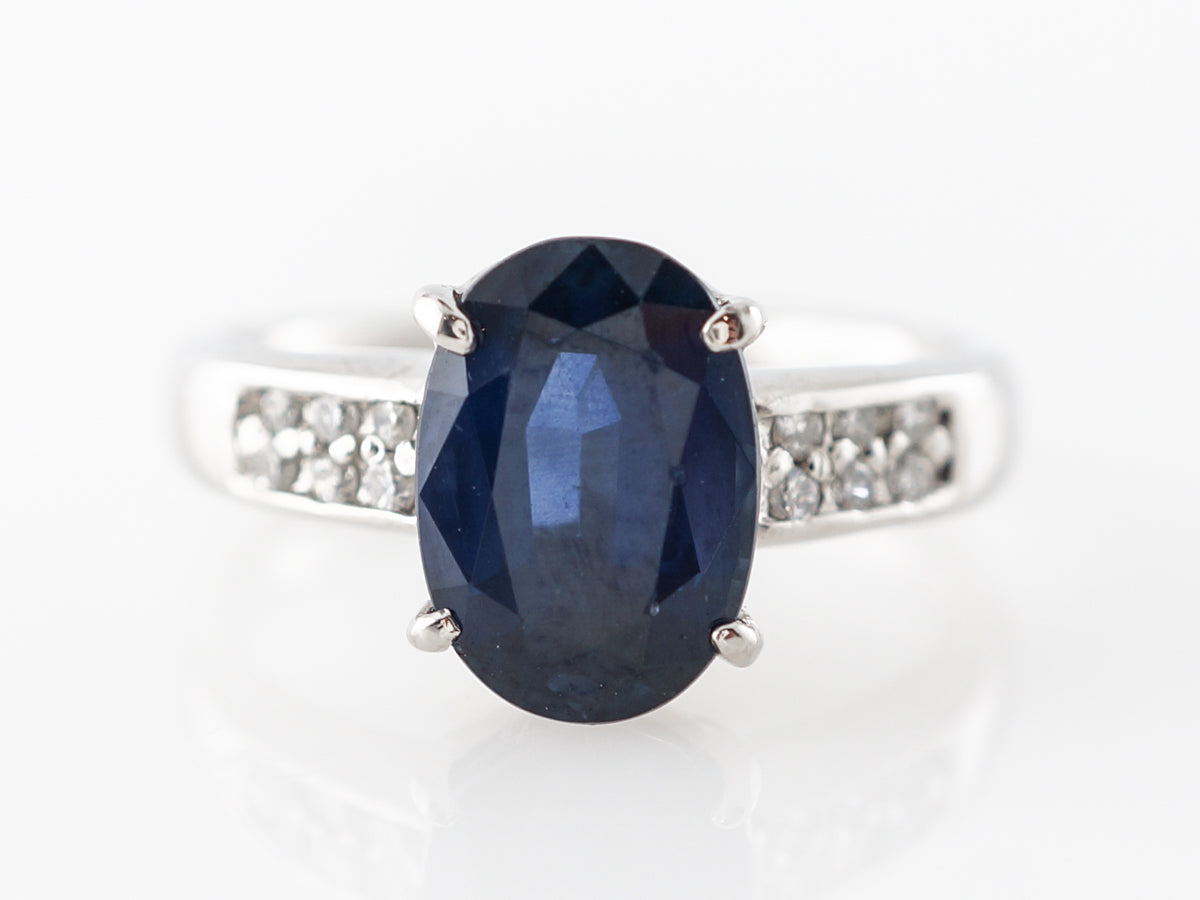 Oval Sapphire & Diamond Engagement Ring in Platinum
