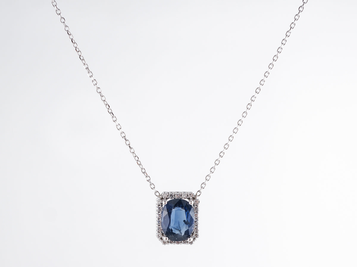 Sapphire & Diamond Halo Pendant in 14k White Gold