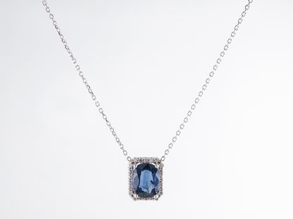 Sapphire & Diamond Halo Pendant in 14k White Gold