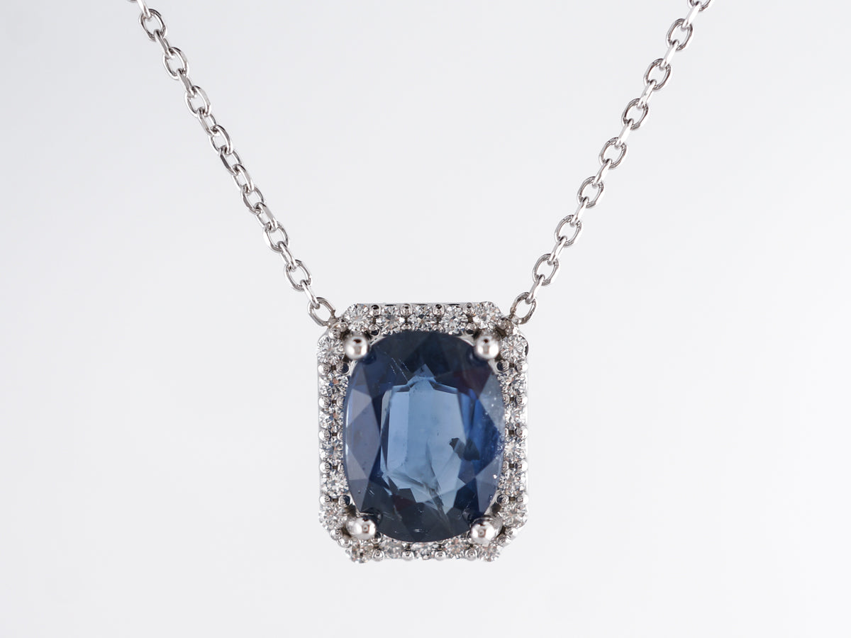 Sapphire & Diamond Halo Pendant in 14k White Gold