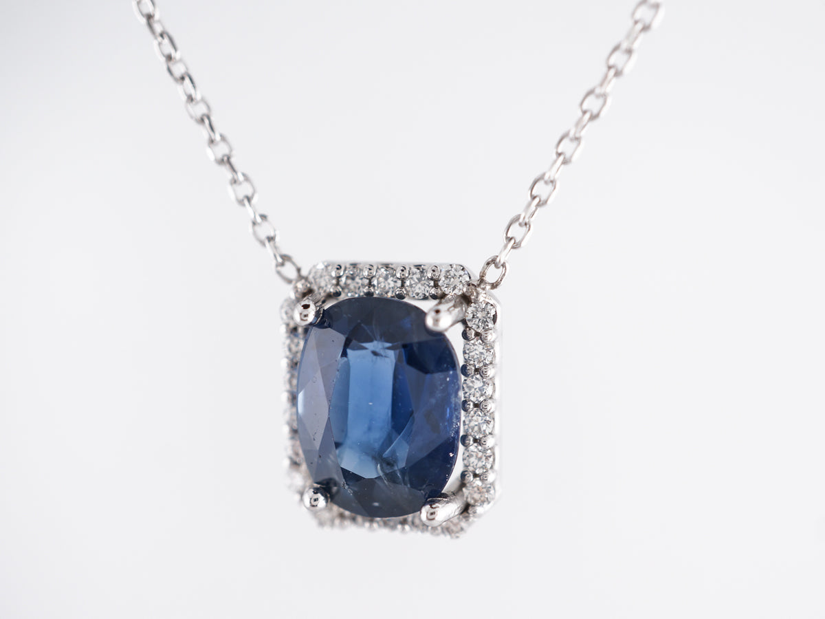 Sapphire & Diamond Halo Pendant in 14k White Gold