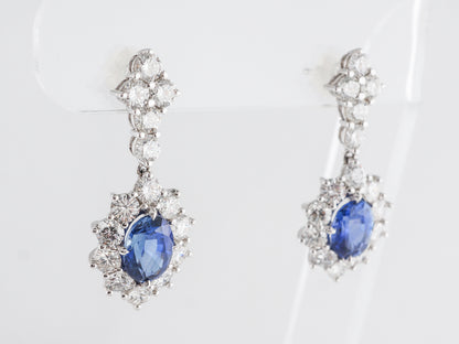 Oval Sapphire w/ Round Diamond Cluster Earrings