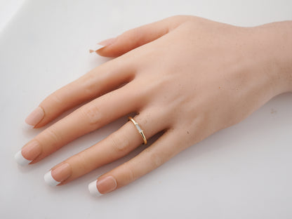 Right Hand Ring Modern .13 Baguette Cut Diamond in 14k Yellow Gold