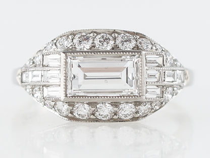Baguette Cut Diamond Halo Engagement Ring in Platinum