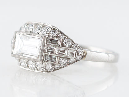 Baguette Cut Diamond Halo Engagement Ring in Platinum