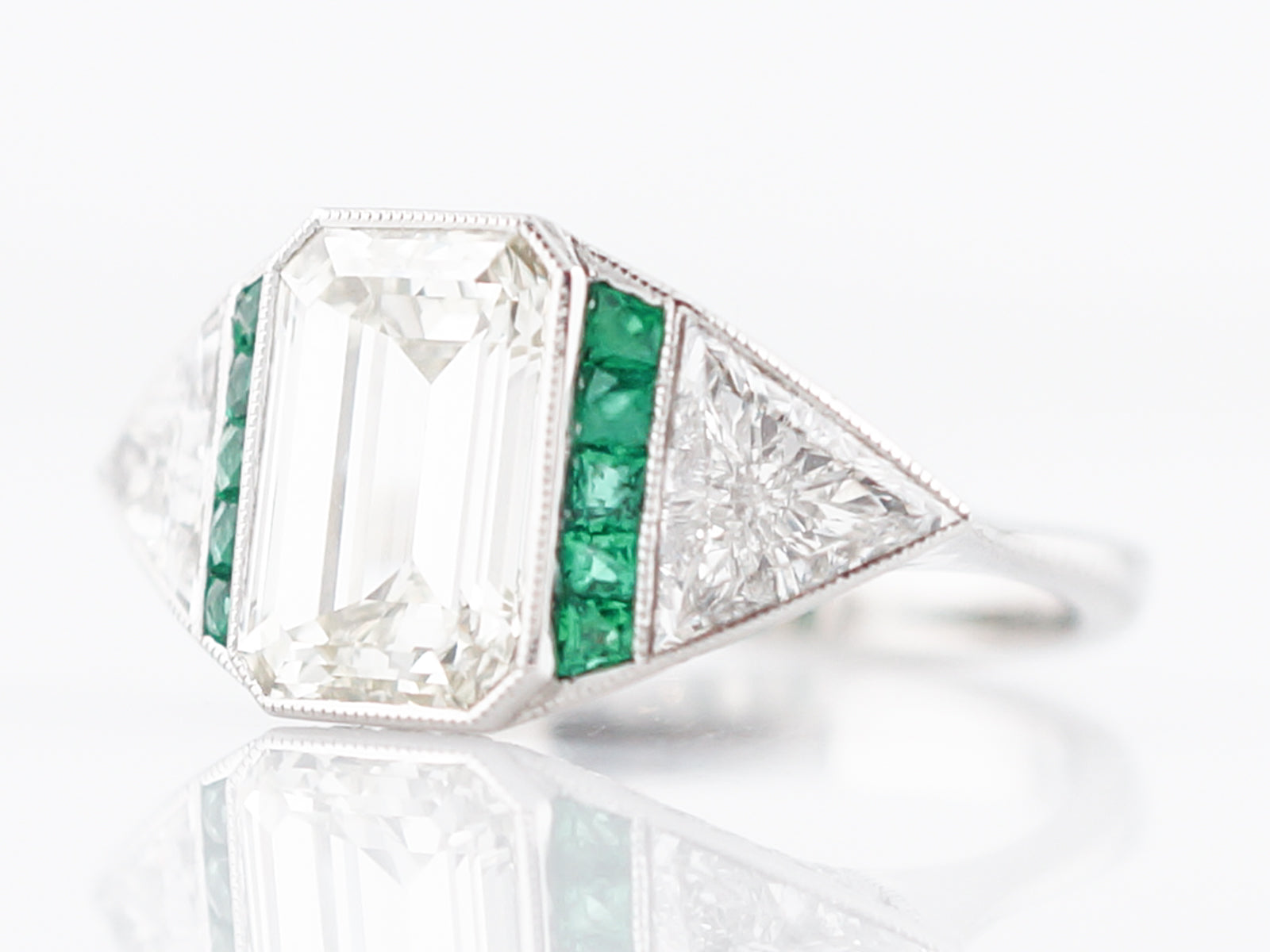 Engagement Ring Modern 2.51 Emerald Cut Diamond & .15 Emeralds in Platinum