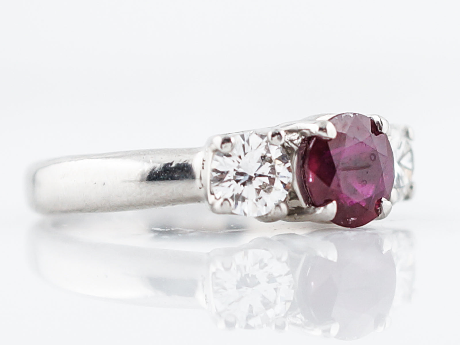 Ruby & Diamond Three Stone Engagement Ring in Platinum