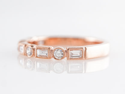 Round & Baguette Diamond Wedding Band in Rose Gold