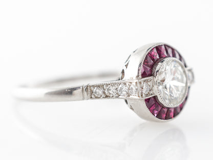 Round Brilliant Diamond & Ruby Halo Engagement Ring