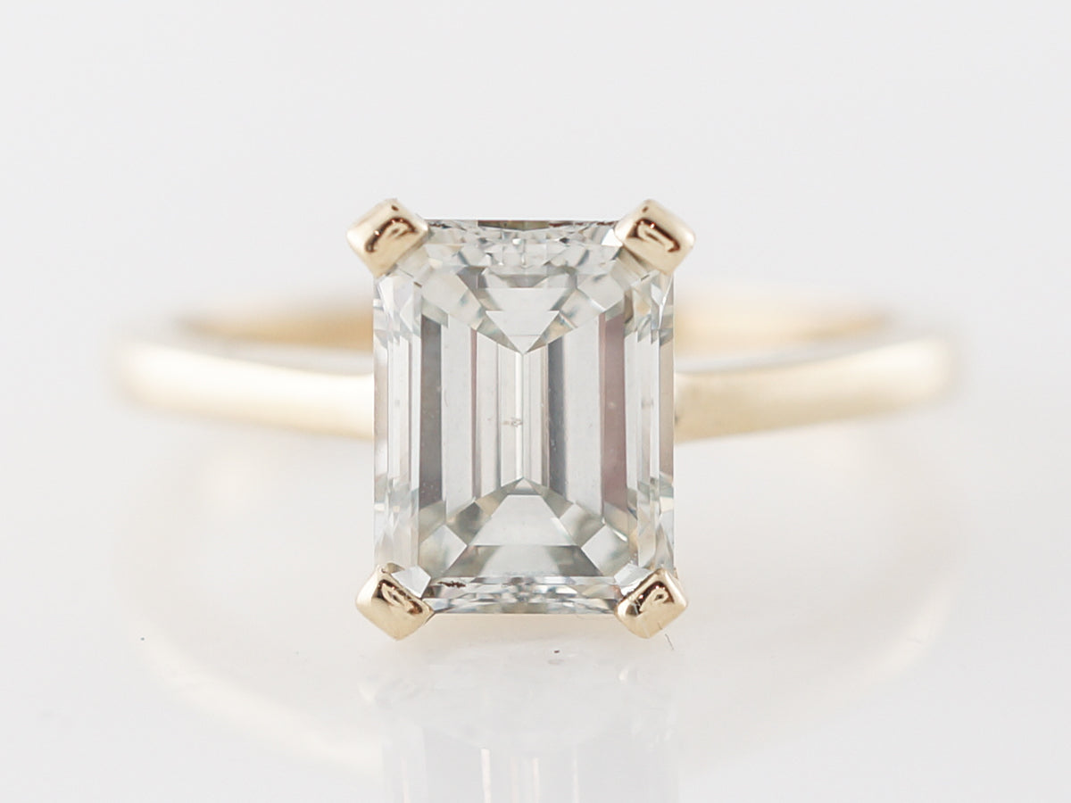 Emerald Cut Diamond Engagement Ring in Yellow Gold