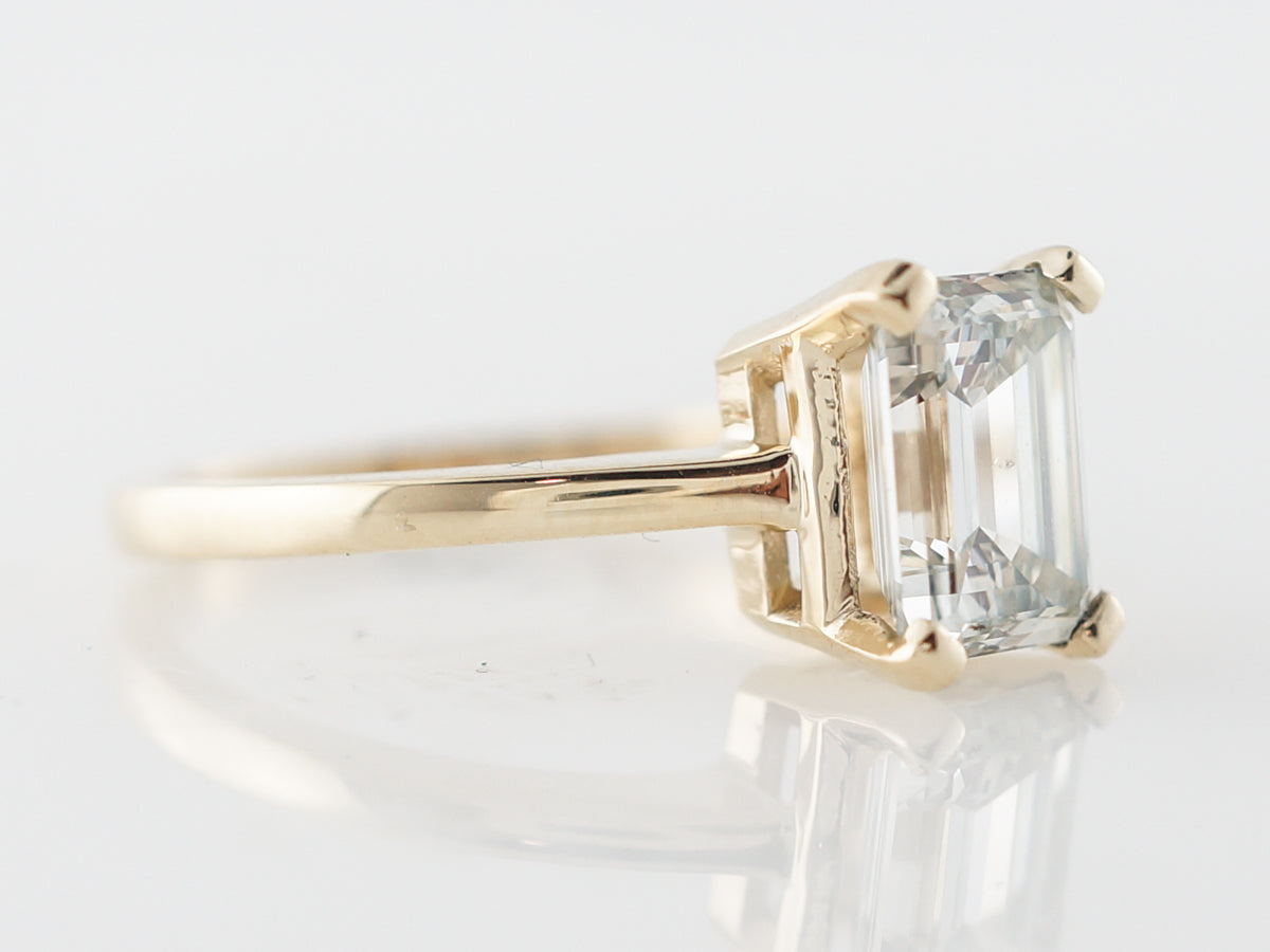 Emerald Cut Diamond Engagement Ring in Yellow Gold